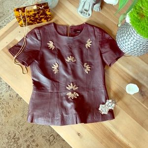 Peplum luxury leather top with golden embroidery